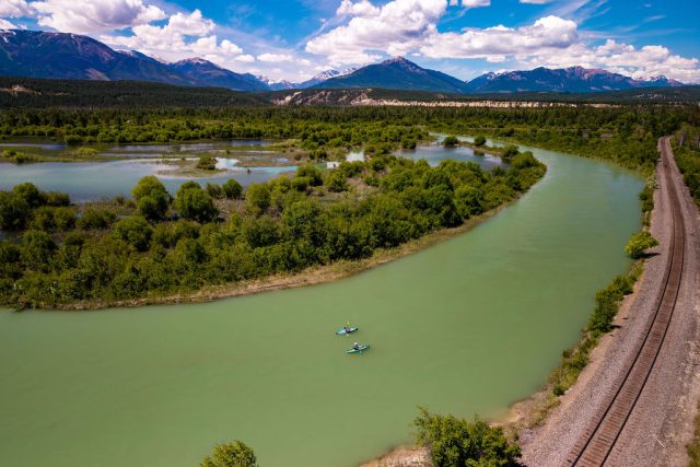 Two people kayaking Columbia River Invermere to Radium